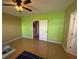 Spacious bedroom with tile flooring and a ceiling fan at 622 Samuel Pl, Davenport, FL 33837