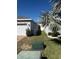 Side view of a house featuring a well-kept lawn and modern exterior details at 622 Samuel Pl, Davenport, FL 33837