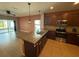 Modern kitchen with stainless steel appliances and granite countertops at 622 Samuel Pl, Davenport, FL 33837