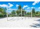 Swing set with multiple swings and lush green surroundings, providing an ideal space for outdoor recreation at 7587 Oakmoss Loop, Davenport, FL 33837