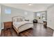 Main bedroom with hardwood floors, ample natural light, and a serene ambiance at 8330 Vivaro Isle Way, Windermere, FL 34786