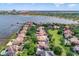 Aerial view showcasing the luxurious homes and their private docks along the waterfront, highlighting the exclusive community at 8814 Southern Breeze Dr, Orlando, FL 32836