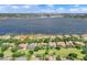 Aerial view of waterfront properties with private docks, revealing the scenic location and upscale neighborhood at 8814 Southern Breeze Dr, Orlando, FL 32836
