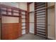 Spacious walk-in closet with custom built-in shelving and ample storage space at 8814 Southern Breeze Dr, Orlando, FL 32836