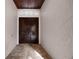 Grand entrance featuring double doors, decorative molding, and travertine flooring, providing a luxurious welcome at 8814 Southern Breeze Dr, Orlando, FL 32836