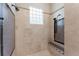 Modern tiled shower featuring a built-in bench and dual shower heads at 8814 Southern Breeze Dr, Orlando, FL 32836