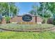 Welcome to Phillips Landing, with beautiful landscaping and a brick entrance at 8814 Southern Breeze Dr, Orlando, FL 32836