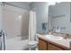 Bathroom featuring a shower and tub combination with a tiled floor at 9568 Muse Pl, Orlando, FL 32829