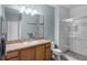 Bright bathroom featuring a shower, vanity, and tiled floor at 9568 Muse Pl, Orlando, FL 32829