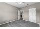 Cozy bedroom with neutral colors and carpet flooring at 9568 Muse Pl, Orlando, FL 32829