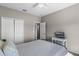 Bedroom featuring a large window with a view, and a ceiling fan at 9568 Muse Pl, Orlando, FL 32829