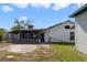 View of backyard with patio and building at 10562 Bridlewood Ave, Orlando, FL 32825