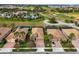 Aerial view of the neighborhood, close to golf course, pool and other community features at 1304 Sea Pines Way, Davenport, FL 33896