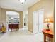 Open hallway showcasing the home's layout, connecting the dining area and other living spaces at 1304 Sea Pines Way, Davenport, FL 33896