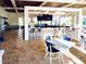 The indoor bar features ample seating and televisions for patrons to enjoy at 1304 Sea Pines Way, Davenport, FL 33896