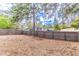 Expansive fenced backyard, offering privacy and room for outdoor activities at 134 E Plantation Blvd, Lake Mary, FL 32746