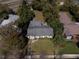 Aerial view of a home showcasing its landscaping, yard, and roof at 1531 Norfolk Ave, Winter Park, FL 32789