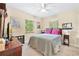 Bedroom featuring posters on the walls and a window with blinds at 1531 Norfolk Ave, Winter Park, FL 32789