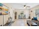 This living room offers tile flooring, a ceiling fan, and is ready for entertaining at 1531 Norfolk Ave, Winter Park, FL 32789