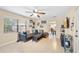 Comfortable living area with tile floors, a ceiling fan, and a view into the dining room at 1531 Norfolk Ave, Winter Park, FL 32789