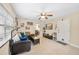 Comfortable living room with tile flooring, and a ceiling fan at 1531 Norfolk Ave, Winter Park, FL 32789