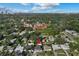 Scenic aerial view of a neighborhood showcasing proximity to parks and green spaces at 1627 Triangle Ave, Orlando, FL 32806