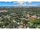 A beautiful home with an aerial view of a city skyline in the background at 1627 Triangle Ave, Orlando, FL 32806