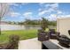 Backyard featuring a view of the water with lawn furniture and some landscaping at 2029 Crystal Bell St, Orlando, FL 32824