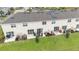 Aerial view of townhome backyards with patios and green space at 2029 Crystal Bell St, Orlando, FL 32824