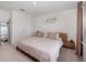 Comfortable bedroom with a stylish platform bed, bedside table, and decor at 2029 Crystal Bell St, Orlando, FL 32824