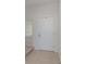 Bright entryway featuring a clean white door and neutral tile flooring at 2029 Crystal Bell St, Orlando, FL 32824