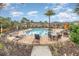 Community pool featuring an inground pool, surrounding furniture and landscaping at 2029 Crystal Bell St, Orlando, FL 32824