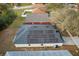 Aerial view of a house featuring solar panels on the roof and a well-maintained exterior at 2234 Rockwood Dr, Apopka, FL 32703