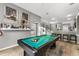 Game room with a pool table, decor, and a view into the kitchen at 2234 Rockwood Dr, Apopka, FL 32703