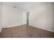 Bedroom with neutral walls, tile flooring, and a view to other rooms in the house at 2978 Stillwater Dr, Kissimmee, FL 34743