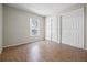 Bedroom with neutral walls, tile flooring, one window, and double closets at 2978 Stillwater Dr, Kissimmee, FL 34743