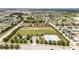 A high angle shot shows the community, the community pool, and the playground at 4115 Ruby Run, Haines City, FL 33844