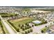 Birds eye view of neighborhood, amenities, community pool, playground, and surrounding homes at 4115 Ruby Run, Haines City, FL 33844