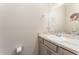 Bathroom featuring a sink with a marble countertop, complemented by a large mirror at 4115 Ruby Run, Haines City, FL 33844
