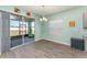 Bright dining area with sliding glass doors leading to an enclosed patio at 4115 Ruby Run, Haines City, FL 33844