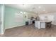 Kitchen with a large center island, stainless steel appliances, and sleek gray cabinetry at 4115 Ruby Run, Haines City, FL 33844