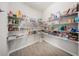 Organized pantry with ample shelving, offering generous space for storing groceries and household items at 4115 Ruby Run, Haines City, FL 33844