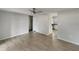 Bright and airy living room with tile flooring, a ceiling fan, and easy access to other areas of the home at 437 Georgia Ave, St Cloud, FL 34769