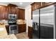 Modern kitchen featuring stainless steel appliances, granite countertops and ample cabinet space at 465 Gee Hammock Ln, Winter Springs, FL 32708