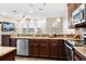 Kitchen featuring stainless steel appliances, granite countertops and stylish backsplash at 465 Gee Hammock Ln, Winter Springs, FL 32708