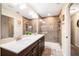 Bathroom features double sinks, a large mirror, and a walk-in shower with glass enclosure at 465 Gee Hammock Ln, Winter Springs, FL 32708