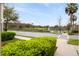 Scenic community view features a pond with fountain and lush green landscaping at 465 Gee Hammock Ln, Winter Springs, FL 32708