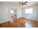 Spacious main bedroom with hardwood floors and a mirrored closet at 5513 Riordan Way, Orlando, FL 32808