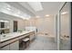 Bathroom with double sink vanity, soaking tub, and skylight providing plenty of natural light at 7213 Greenville Ct, Orlando, FL 32819