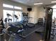 Well-equipped fitness center with modern exercise machines, weights, and a ceiling fan at 7213 Greenville Ct, Orlando, FL 32819